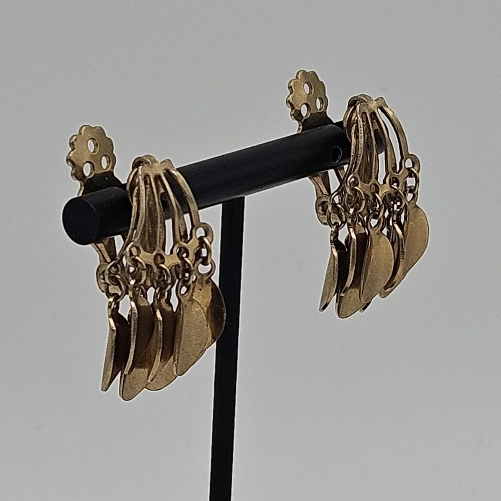 vintage gold tone clip on earrings with oval shaped dangles